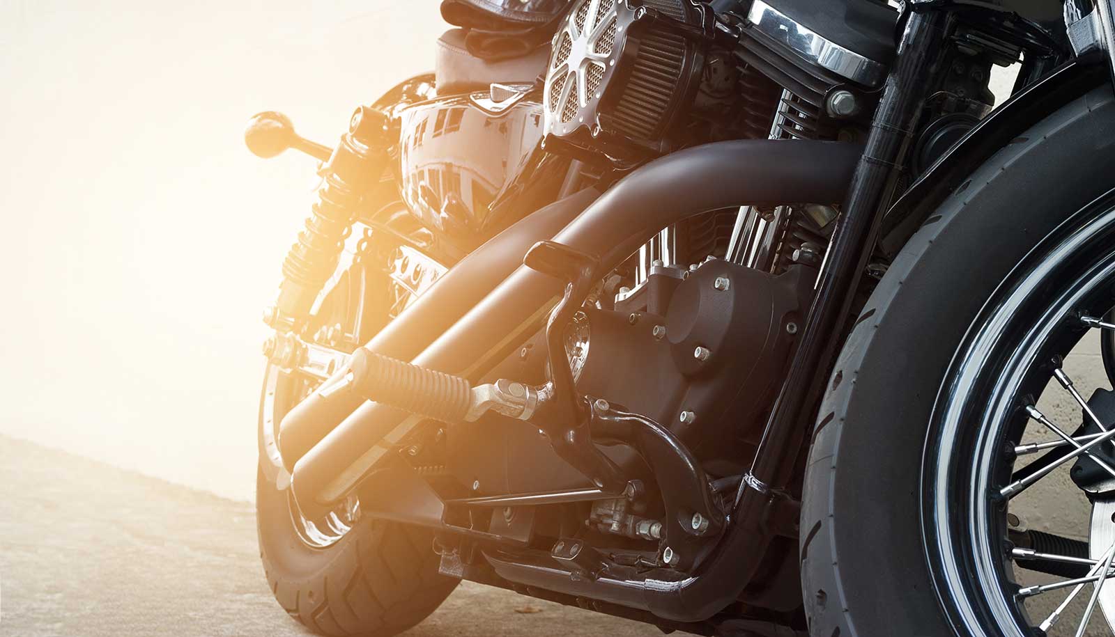 black cruiser motorcycle on soil